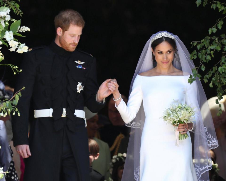 Meghan Markle and Prince Harry leave St George's Chapel at Windsor Castle following their wedding (REUTERS)