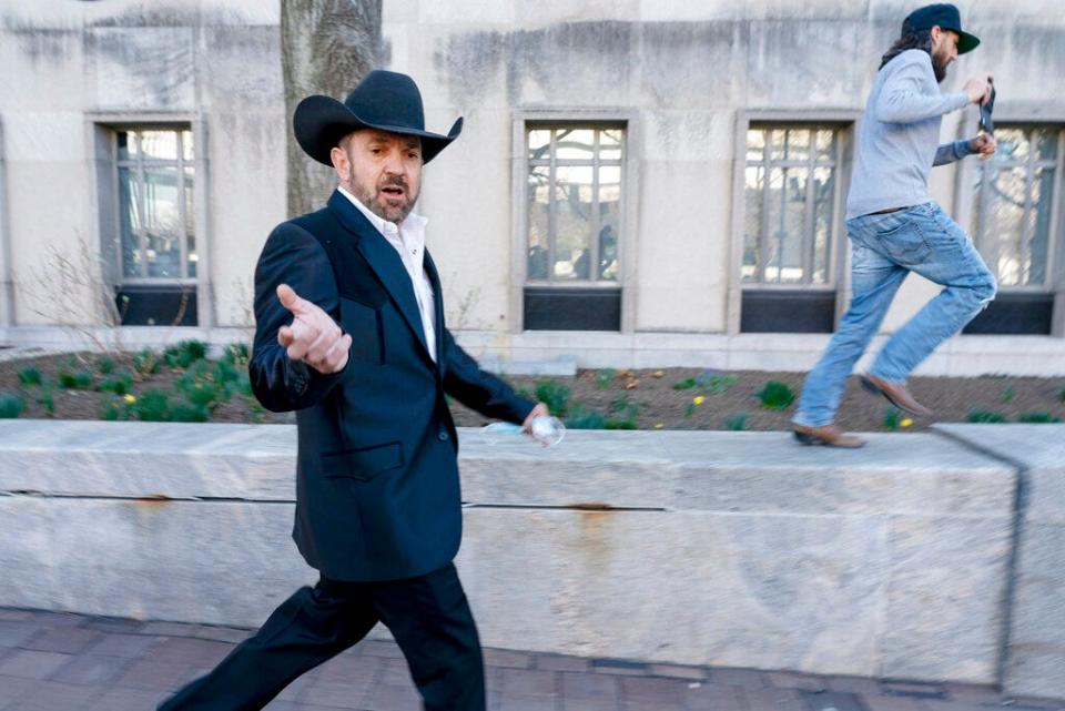 Otero County Commissioner Couy Griffin arrives at the Federal Court House in Washington, Monday, March 21, 2022. Griffin is charged with illegally entering Capitol grounds the day a pro-Trump mob disrupted certification of Joe Biden's presidential election victory on Jan. 6, 2021.