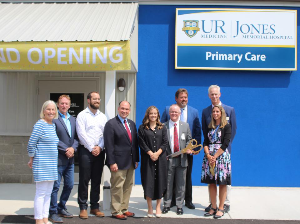 Rep. Nick Langworthy, center, Jones Memorial Hospital officials and community members gather outside the new medical office building at 13 Main St. in Andover Wednesday.