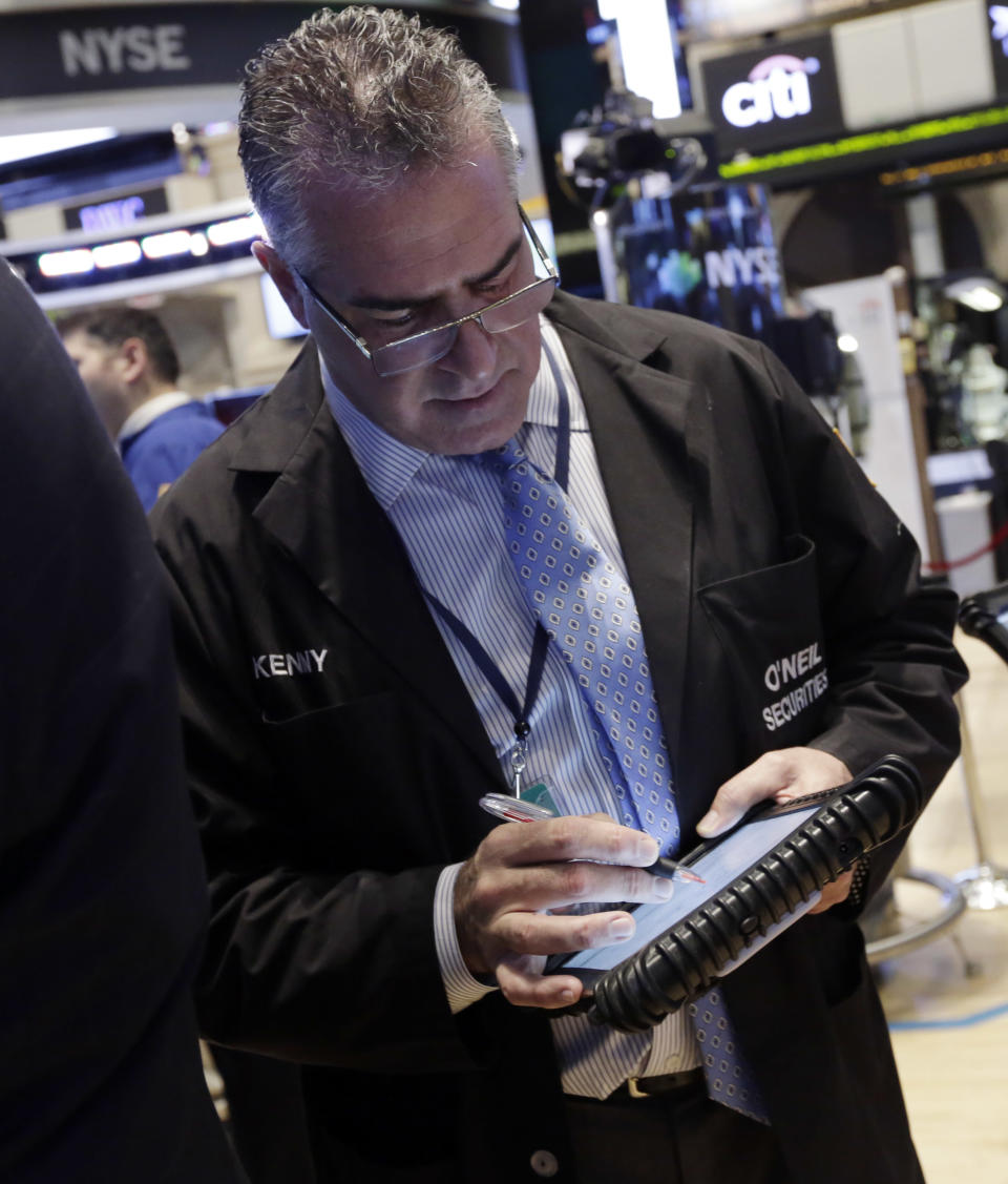 Trader Kenneth Polcari works on the floor of the New York Stock Exchange Monday, Jan. 27, 2014. Stocks are mostly higher on Wall Street as investors shrug off worries about emerging markets that tanked the market last week. (AP Photo/Richard Drew)