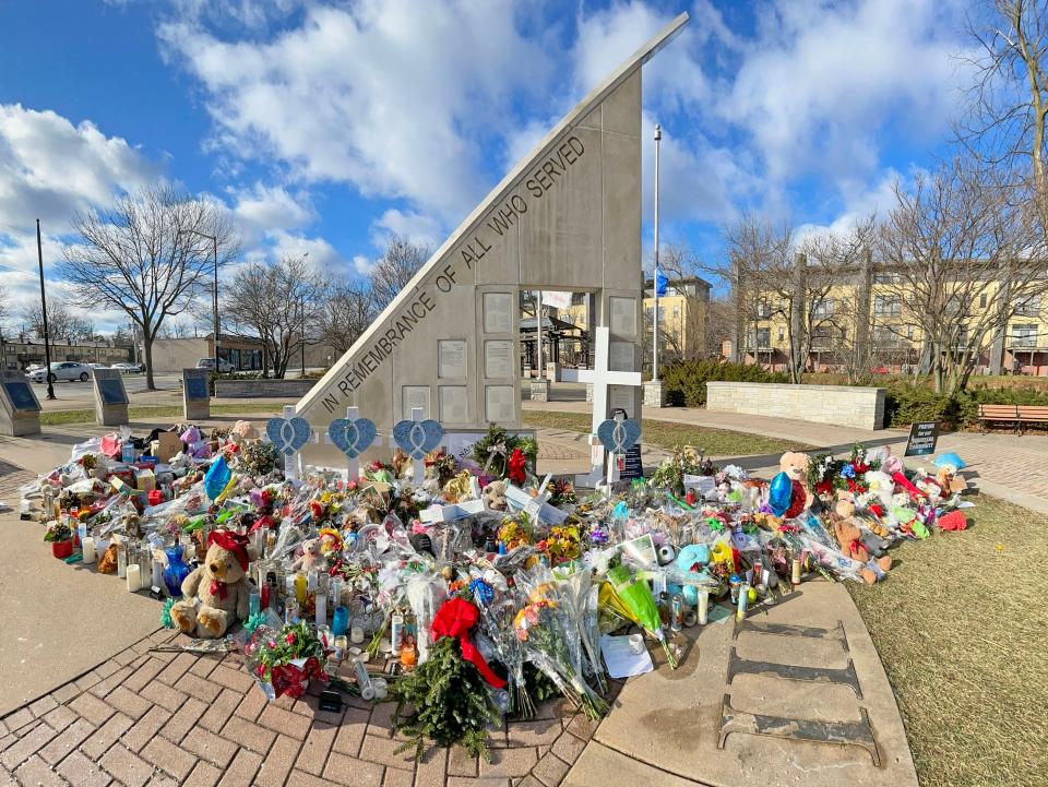 Items are left at Veterans Park in Waukesha on Dec. 6 as a memorial commemorating those who were killed in the Waukesha Christmas Parade tragedy that left six people dead and more than 60 injured.