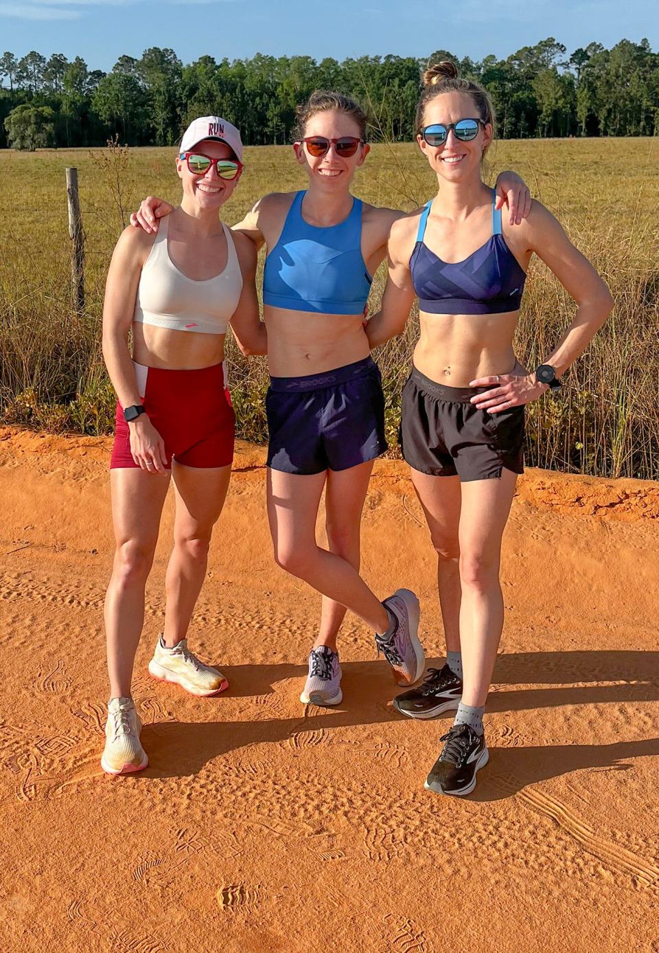 Hansons-Brooks Original Distance Project teammates, from left, Jessie Cardin, Olivia Pratt and Anne-Marie Blaney pause for a breather after a taper-down workout in Florida, in preparation for the Boston Marathon.