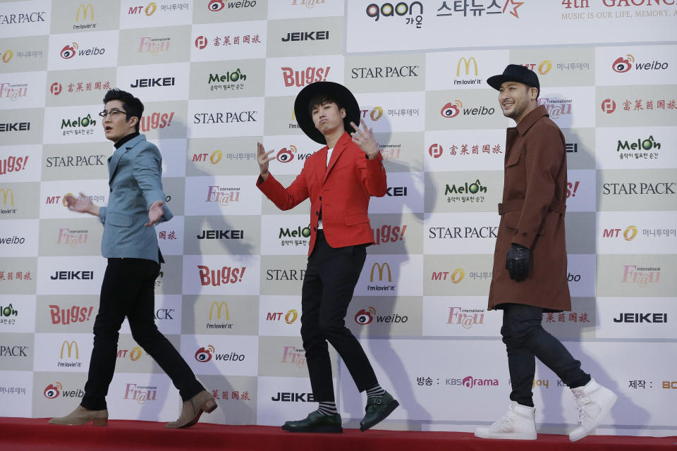 FILE - In this Jan. 28, 2015, file photo, South Korean K-Pop group Epik High members arrive to attend the K-POP Awards 2014 in Seoul, South Korea. Popular South Korean hip-hop trio Epik High was working on a song called “End of the World” before the pandemic hit in 2020. Now, the band's frontman Tablo says, “I wish that this song is not relevant.” (AP Photo/Ahn Young-joon, File)