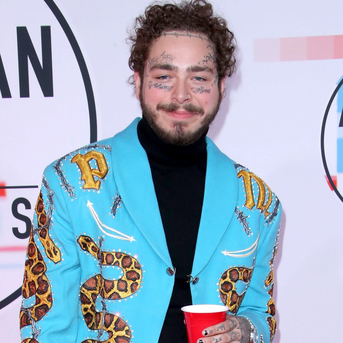 See Post Malone's $1.6 Million New Smile Complete With, Um, Diamond Fangs