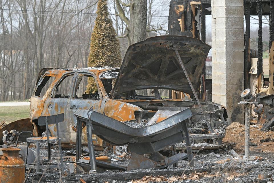 Fire damage to a car sustained during a garage fire on March 15.