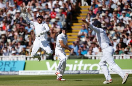 Britain Cricket - England v Pakistan - Third Test - Edgbaston - 7/8/16 England's Alastair Cook and Jonny Bairstow celebrate the wicket of Pakistan's Misbah-ul-Haq Action Images via Reuters / Paul Childs