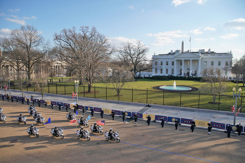 <p>Members of the D.C.'s Metropolitan Police Department ride by the White House on motorcycles during the 59th presidential inauguration parade on Jan. 20.</p>