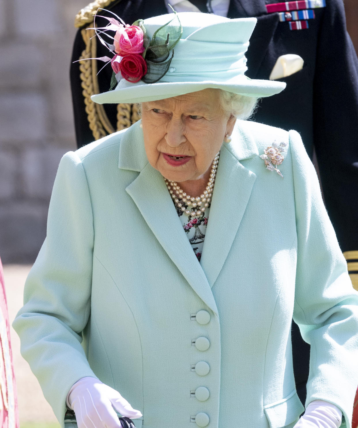 WINDSOR, ENGLAND - JULY 17: Queen Elizabeth II arrives to award Captain Sir Thomas Moore with the insignia of Knight Bachelor at Windsor Castle on July 17, 2020 in Windsor, England. British World War II veteran Captain Tom Moore raised over £32 million for the NHS during the coronavirus pandemic. (Photo by UK Press Pool/UK Press via Getty Images)