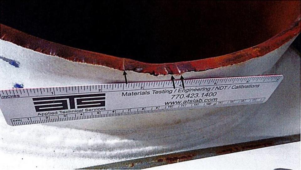 A metallurgical report on the Carowinds Fury 325 roller coaster showing the fractured surface of the tube side of the support column. It showed signs of “multiple-origin” fatigue, the report said.