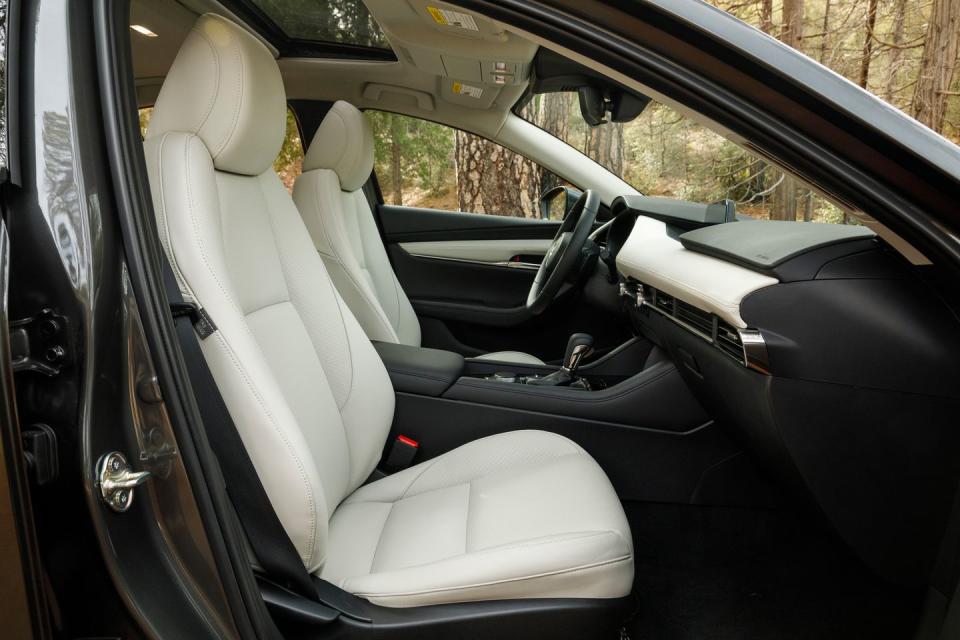 <p>Engineers on hand tried to convince us that the 3's new front seats locate the pelvis in a way that eases the work required by the occupant's upper body to control itself in response to bumps and corners.</p>