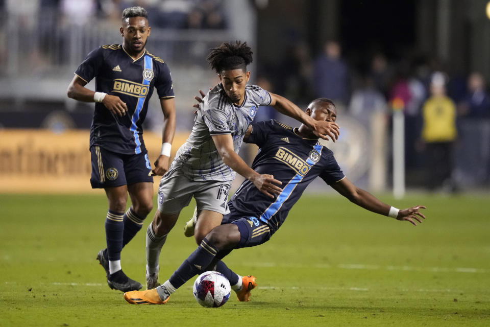 CF Montréal's Nathan-Dylan Saliba, left, and Philadelphia Union's Andrés Perea, right, collide during the second half of an MLS soccer match, Saturday, June 3, 2023, in Chester, Pa. (AP Photo/Matt Slocum)