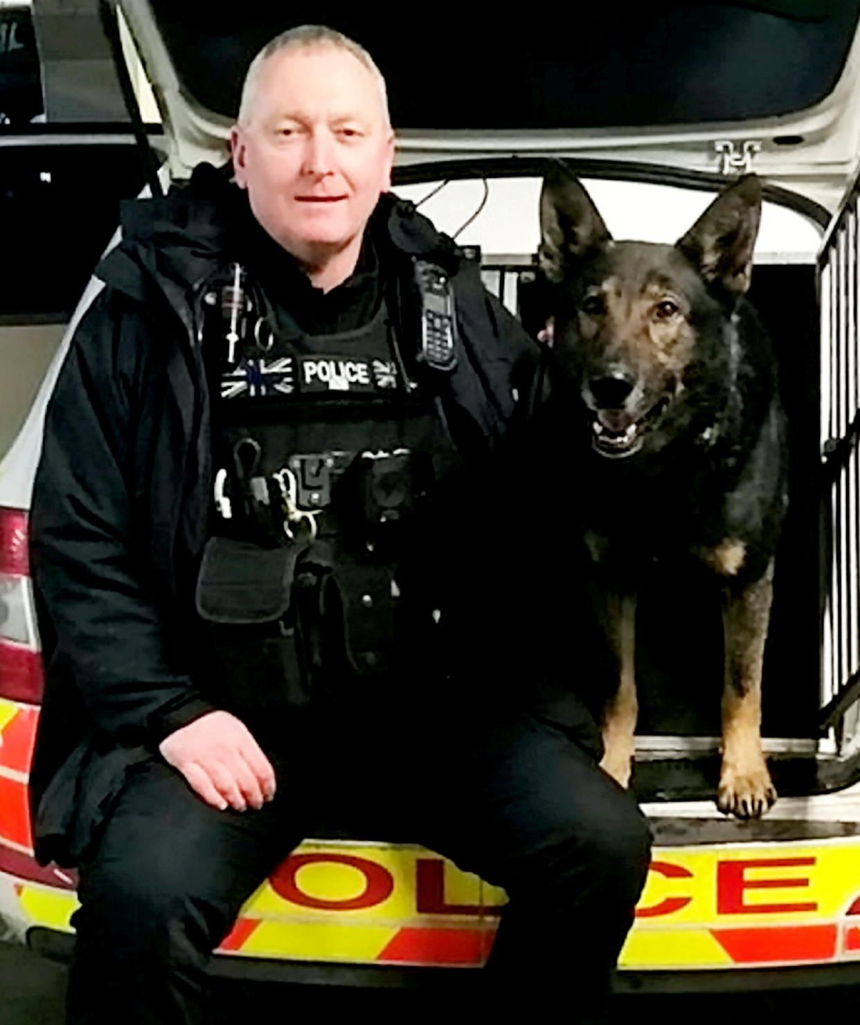 Odin and his handler PC Carl Woodall (Picture: SWNS)
