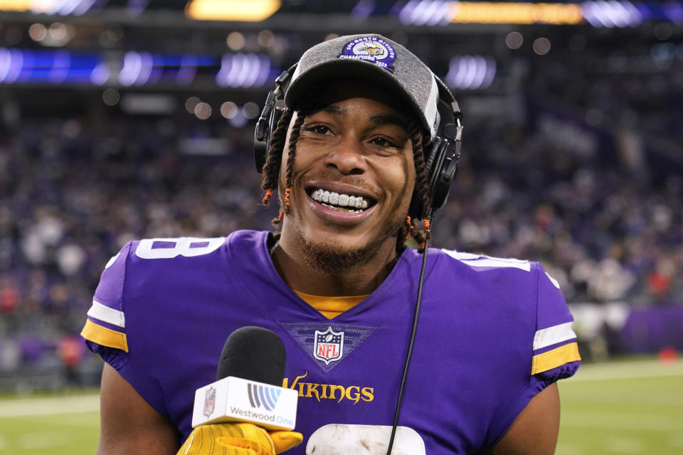 Minnesota Vikings wide receiver Justin Jefferson is interviewed after an NFL football game against the Indianapolis Colts, Saturday, Dec. 17, 2022, in Minneapolis. The Vikings won 39-36 in overtime. (AP Photo/Abbie Parr)