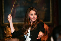Expelliarmus! Kate tries a wand during the Harry Potter Tour at the inauguration of Warner Bros Studios in north London, in April 2013. She certainly looks surprised by the results of her spell. (Paul Rogers/AFP)