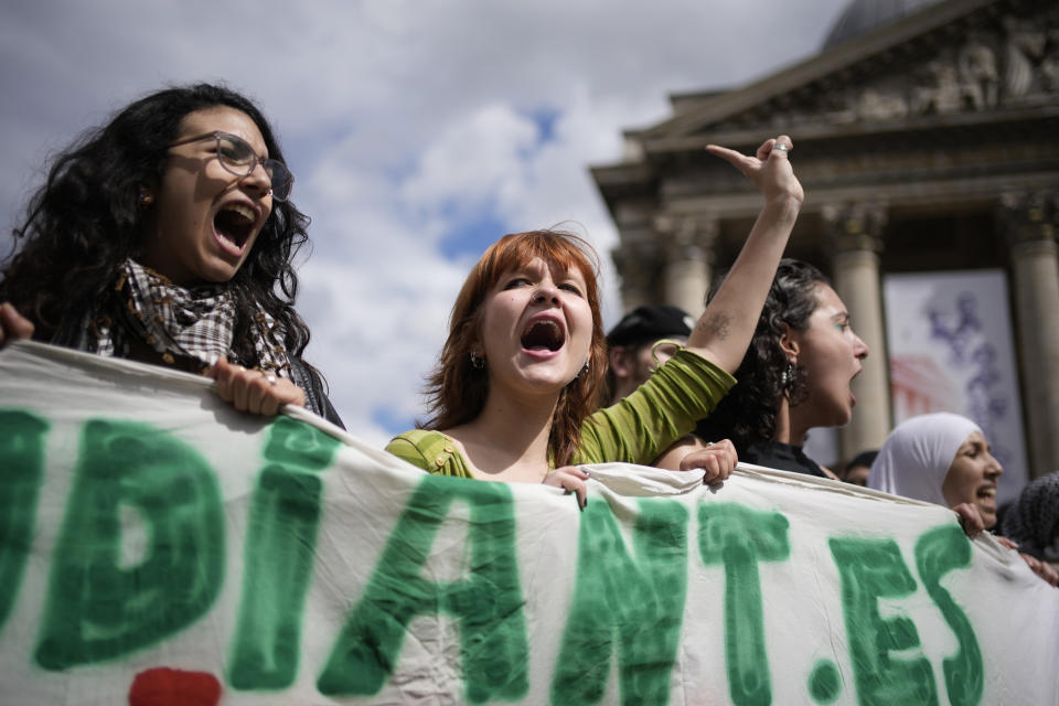 Students shout during a protest outside the Pantheon monument Friday, May 3, 2024 in Paris. Students waved Palestinian flags and chanted slogans in support of residents of Gaza, as Israel continues its offensive following the deadly Oct. 7 Hamas-led attack that triggered the Israeli-Hamas war. (AP Photo/Christophe Ena)