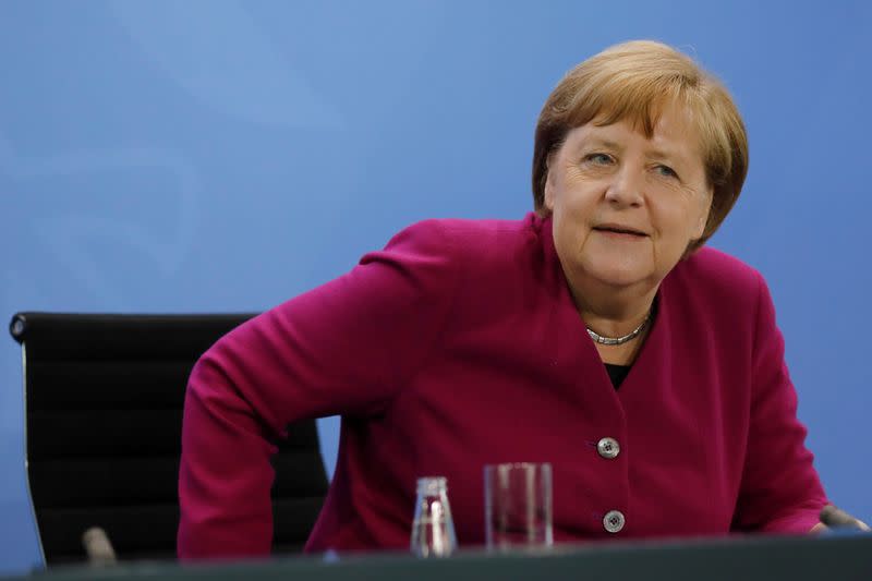 German Chancellor Angela Merkel briefs the media after a meeting with German federal state governors at the Chancellery in Berlin