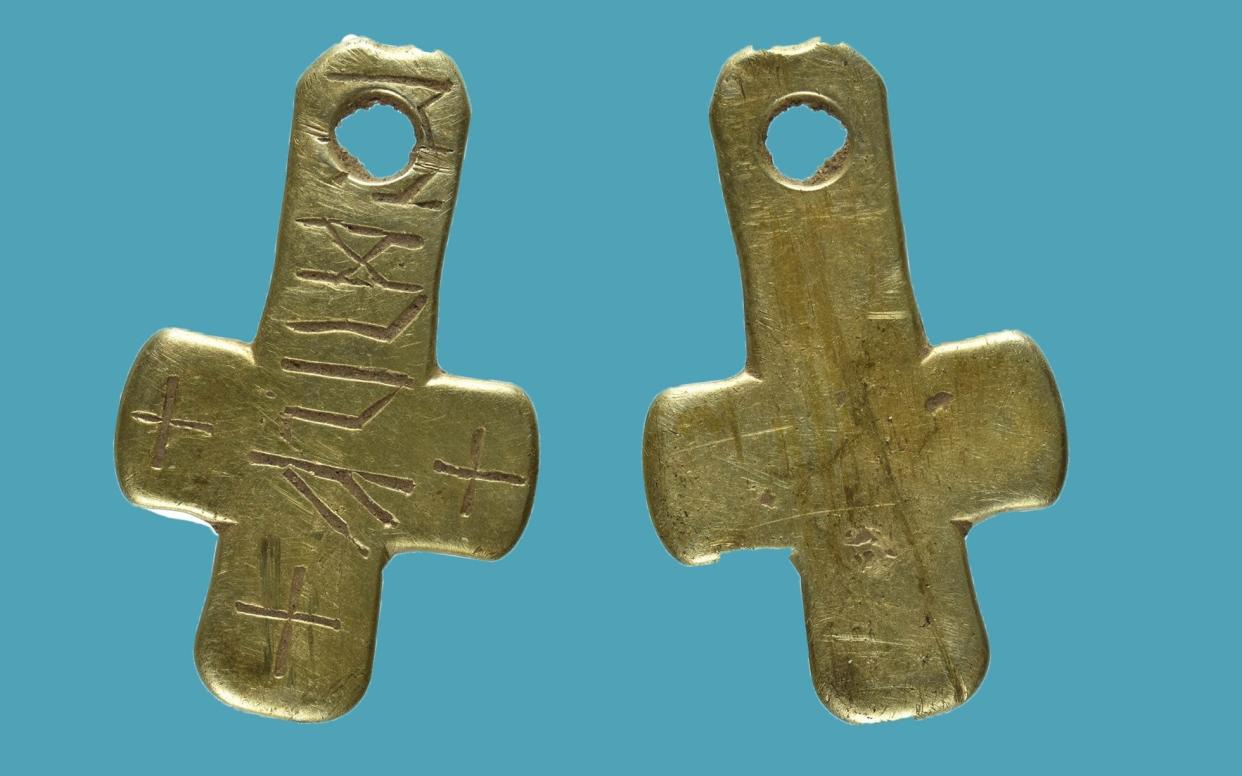 A gold cross pendant was etched with runes which spell out 'Eadruf', a previously unknown name - British Museum/PA Wire
