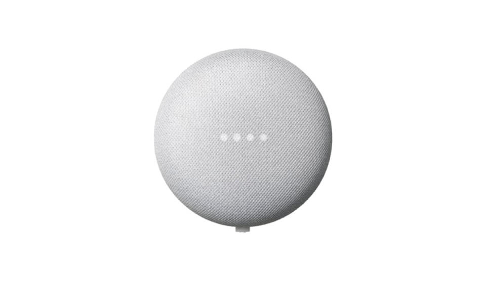 Light gray google nest mini sphere with 4 light dots illuminated.