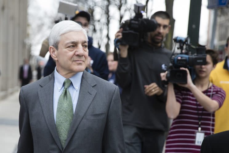 Former Penn State president Graham Spanier walks out of court after being found guilty of child endangerment. (AP)