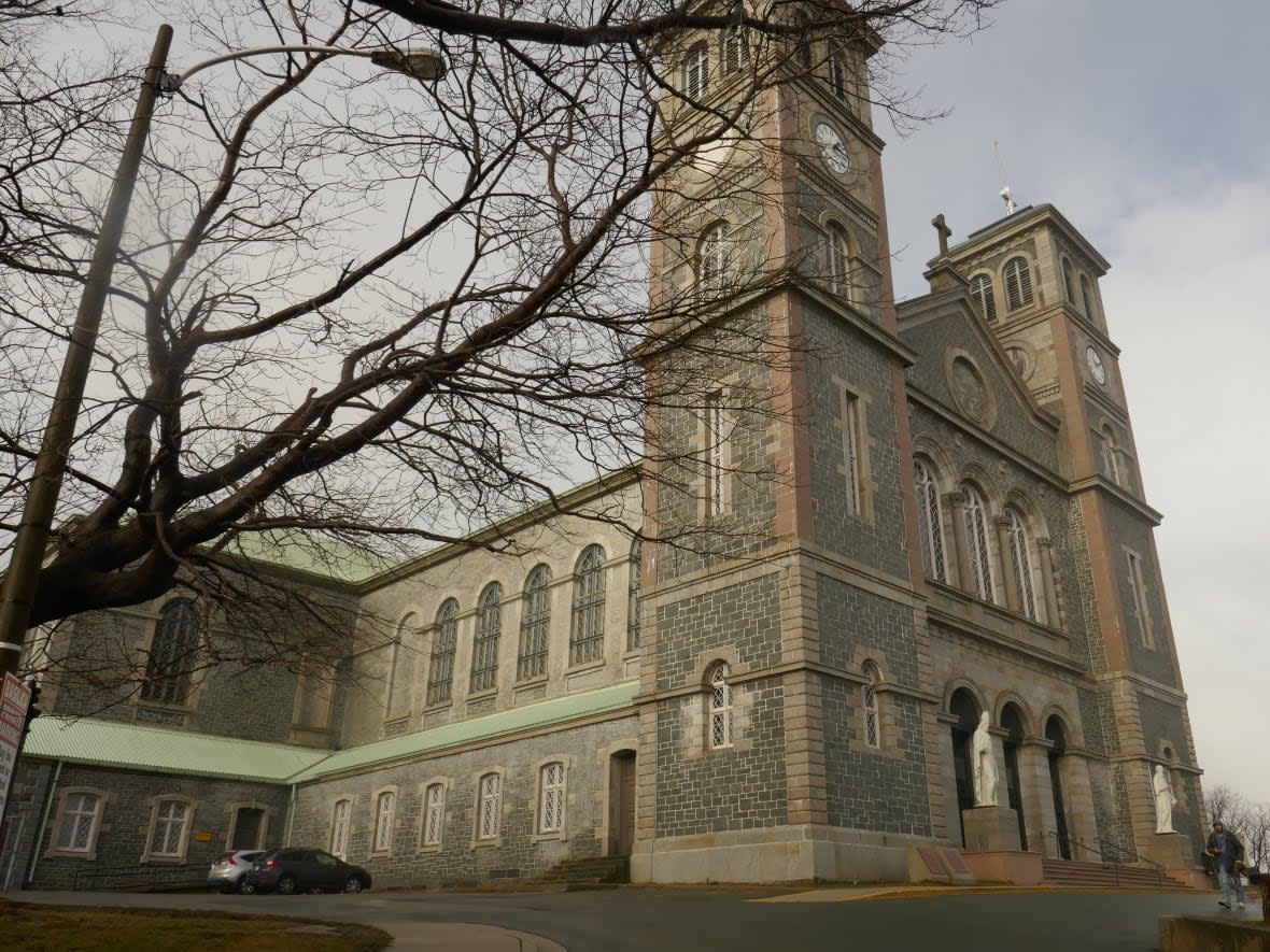 The sale of the Basilica Cathedral, as well as 12 other churches, has been approved to settle abuse victim claims. (Heather Barrett/CBC - image credit)