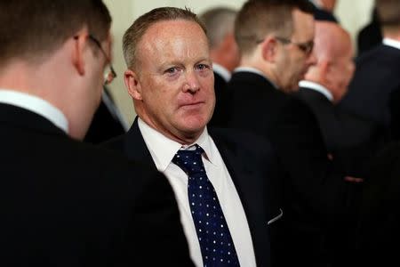 FILE PHOTO: Former White House Press Secretary Sean Spicer attends a ceremony recognizing the first responders to the June 14 shooting involving Congressman Steve Scalise at the White House in Washington, U.S. July 27, 2017. REUTERS/Jonathan Ernst