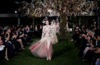 Models present creations by designer Maria Grazia Chiuri from Christian Dior's Haute Couture Spring-Summer 2017 during live show to celebrate Dior's new flagship store at the rooftop of Ginza Six mall in Tokyo, Japan, April 19, 2017. REUTERS/Toru Hanai