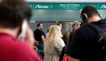 Passengers await their flight at Fiumicino international airport in Rome, Italy April 5, 2017. REUTERS/Remo Casilli