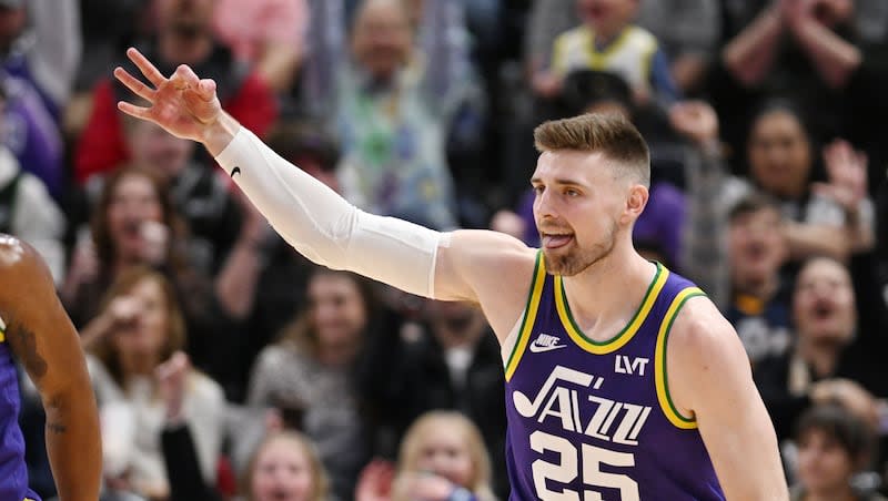 Utah Jazz center Micah Potter celebrates a 3-point shot as the Jazz and Celtics play at the Delta Center in Salt Lake City on Tuesday, March 12, 2024. Celtics won 123-107.