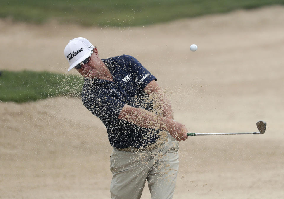Charley Hoffman plays a shot from a bunker on the 14th hole during the third round of the Texas Open golf tournament, Saturday, April 6, 2019, in San Antonio. (AP Photo/Eric Gay)