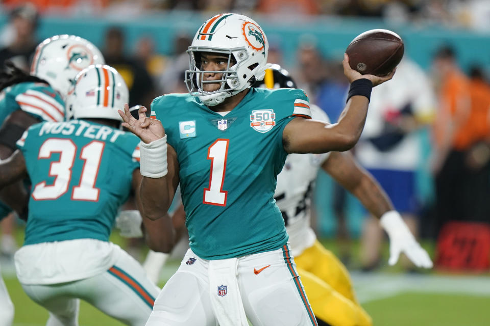 Miami Dolphins quarterback Tua Tagovailoa (1) aims a pass during the first half of an NFL football game against the Pittsburgh Steelers, Sunday, Oct. 23, 2022, in Miami Gardens, Fla. (AP Photo/Wilfredo Lee )