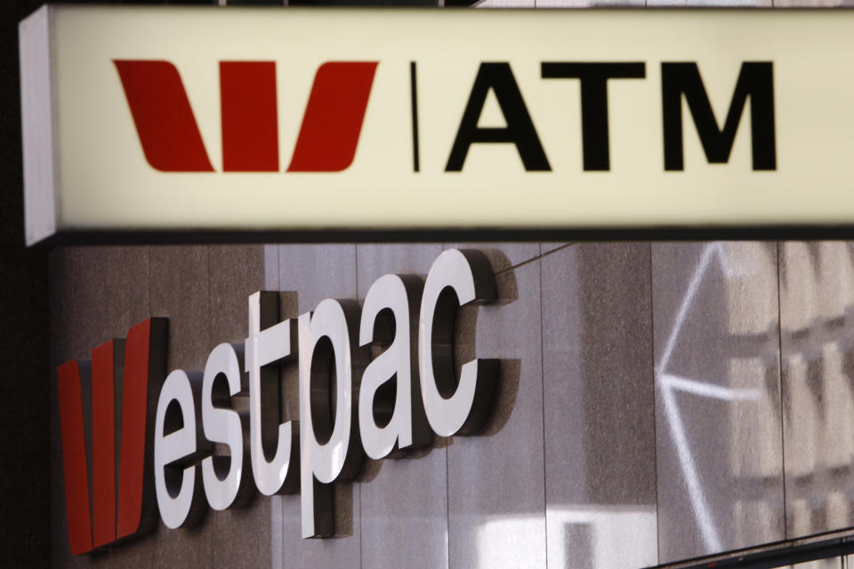 In this Nov. 3, 2010, file photo, signs are displayed at a Westpac branch in Sydney, Australia. Major Australian bank Westpac is facing a potentially massive fine after being accused of 23 million breaches of the anti-money laundering and counterterrorism financing act. (AP Photo/Rick Rycroft, FIle)