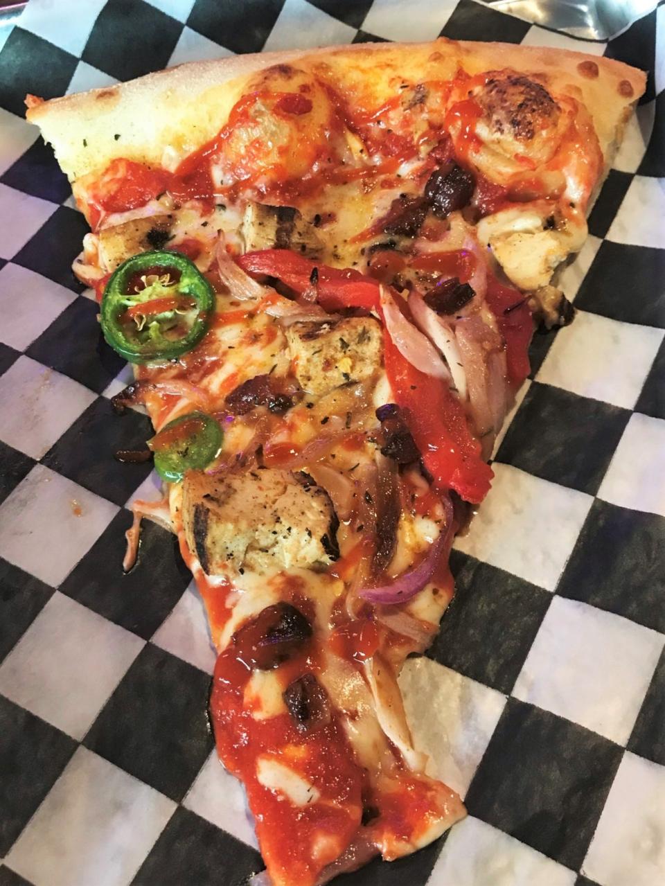 A specialty slice from Rendezvous Pizza in downtown Oklahoma City.