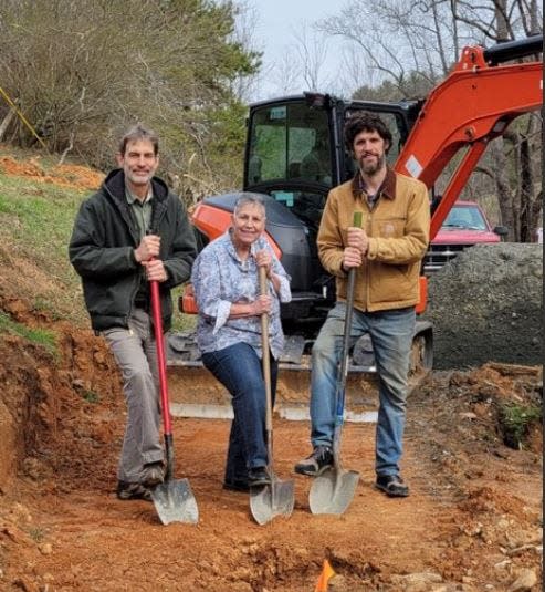 Community Housing Coalition's construction manager for its new Affordable Replacement Housing Program Matt Bennett, left, poses with CHC Executive Director Chris Watson, right, and the program's first client, Celina Uribe, at the program's groundbreaking ceremony in February.