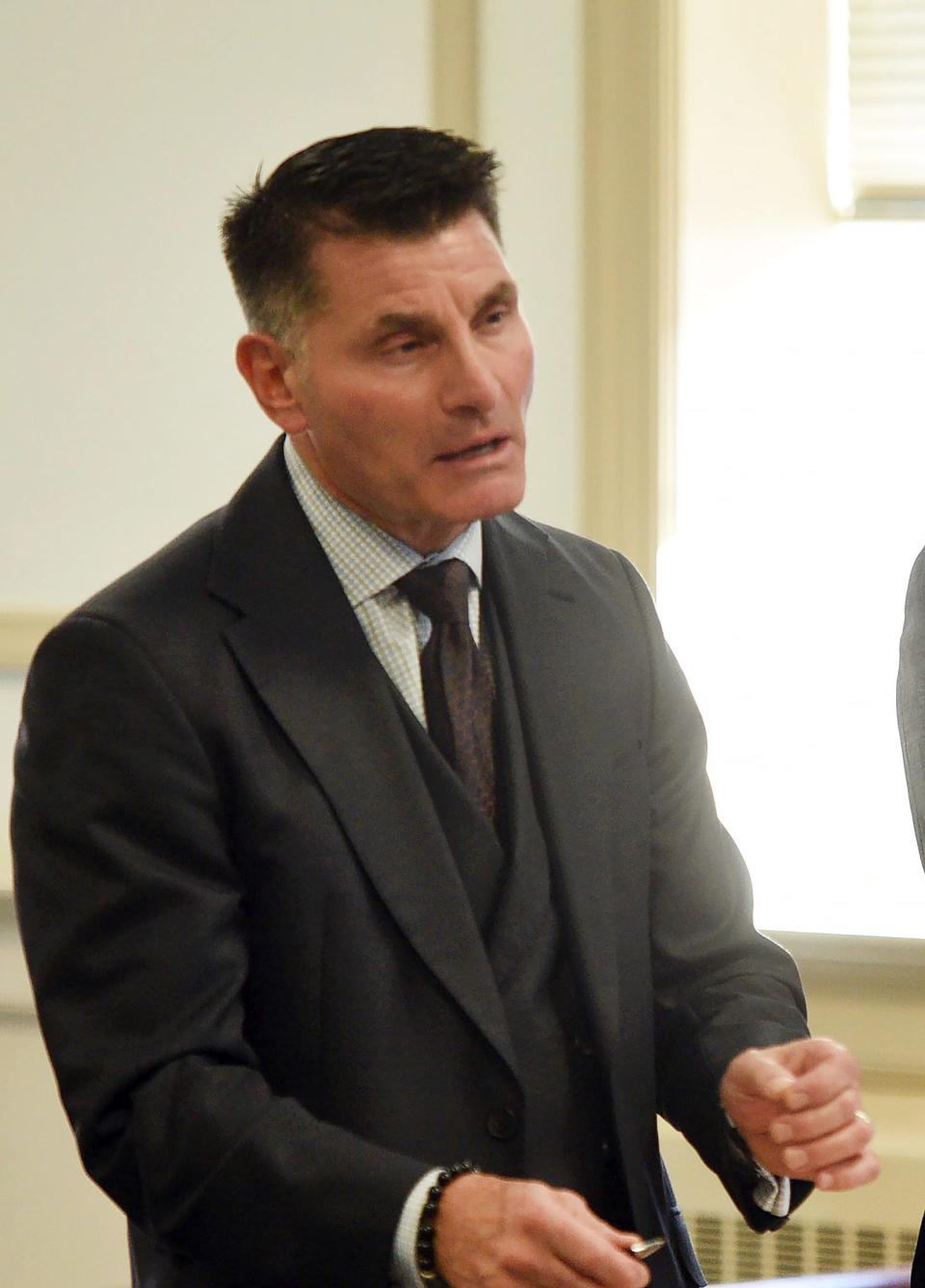 John P. Daley, who is charged with placing a camera in female bathrooms, is seen with his defense lawyer James M. Porfido during his arraignment  before Morris County Judge Steven Taylor, 4th floor at Morris County Courthouse in Morristown on 10/21/19.