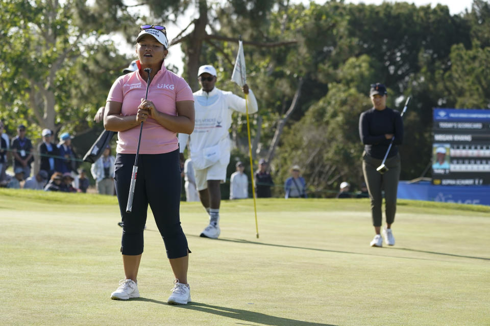 Megan Kang reacts after a putt on the 18th green during the final round of the LPGA's Palos Verdes Championship golf tournament on Sunday, May 1, 2022, in Palos Verdes Estates, Calif. (AP Photo/Ashley Landis)