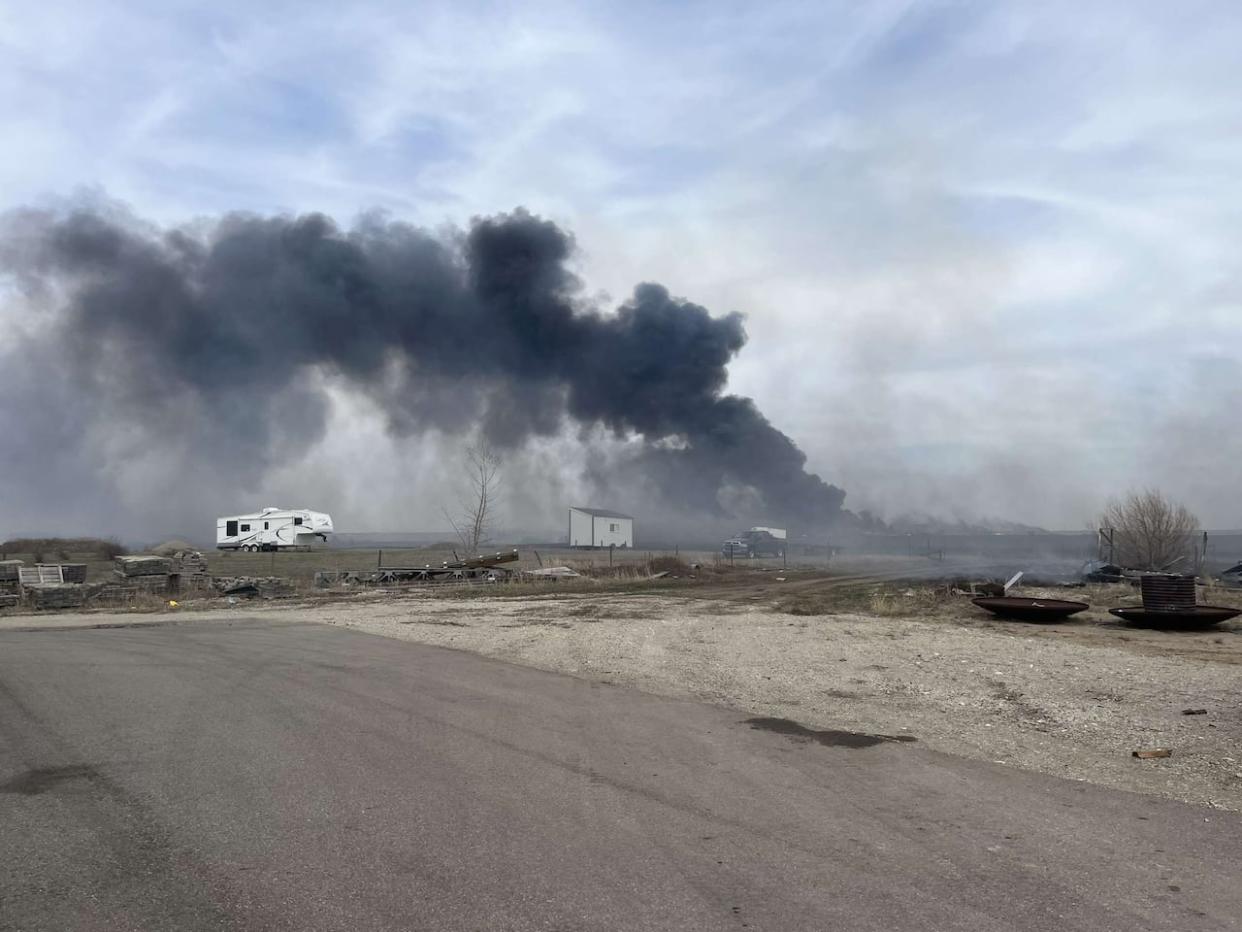 A fire near Regina Beach on Sunday threatened homes and structures in the area. (Submitted by Shelby Barber - image credit)