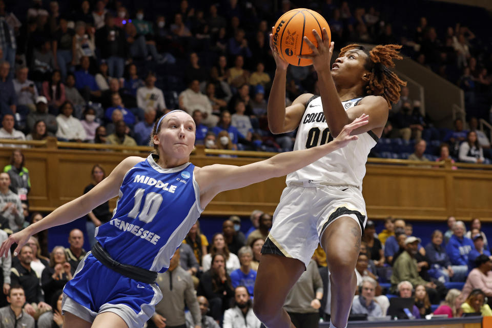 Colorado's Jaylyn Sherrod (00) shoots the ball over Middle Tennessee State's Jalynn Gregory (10) during the second half of a first-round college basketball game in the NCAA Tournament, Saturday, March 18, 2023, in Durham, N.C. (AP Photo/Karl B. DeBlaker)