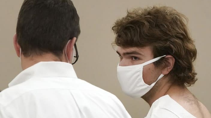 Payton Gendron talks with his attorney during his arraignment in Buffalo City Court in Buffalo, N.Y on Saturday. Gendron was arraigned on first-degree murder charges and ordered detained without bail. (Photo: Mark Mulville/The Buffalo News via AP)