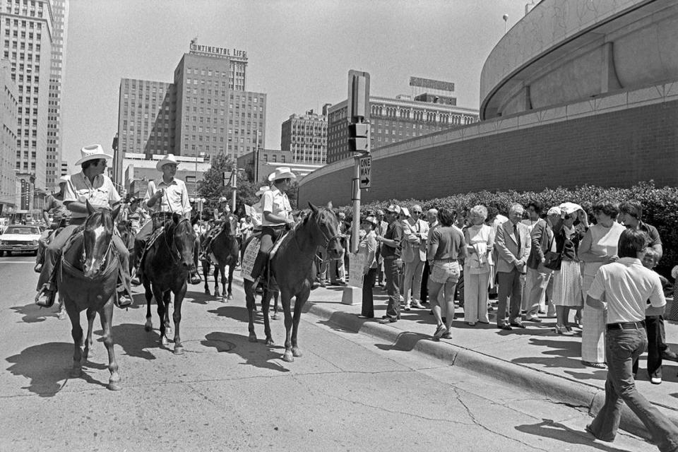 A procession of men on horseback in downtown Fort Worth during President Jimmy Carter’s visit to the city on June 23, 1978, appearing to be staging a protest outside the Tarrant County convention center, where Carter was to speak at a luncheon. Gene Gordon