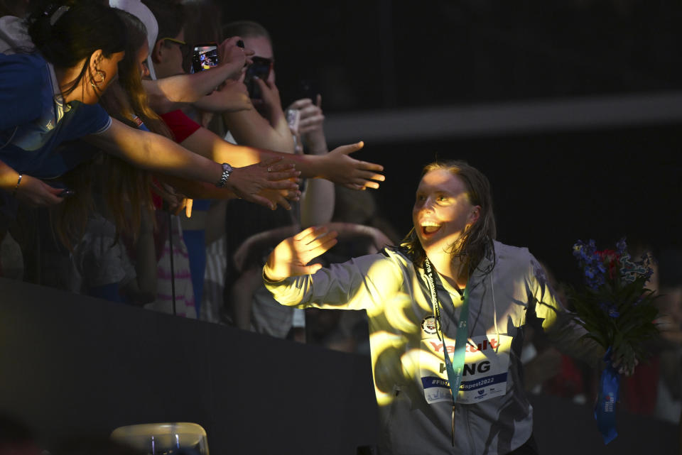 Gold medalist Lilly King of the United States celebrates after the Women 200m Breaststroke final at the 19th FINA World Championships in Budapest, Hungary, Thursday, June 23, 2022. (AP Photo/Anna Szilagyi)