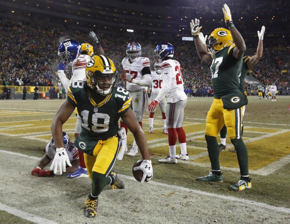 Green Bay Packers wide receiver Randall Cobb (18) celebrates after making a touchdown reception during the first half of an NFC wild-card NFL football game against the New York Giants, Sunday, Jan. 8, 2017, in Green Bay, Wis. (AP Photo/Mike Roemer)