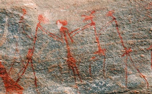 <span class="caption">Rock art showing a hunter-gatherer ritual dance; Kondoa, Tanzania</span> <span class="attribution"><span class="source">Nick Longrich</span></span>