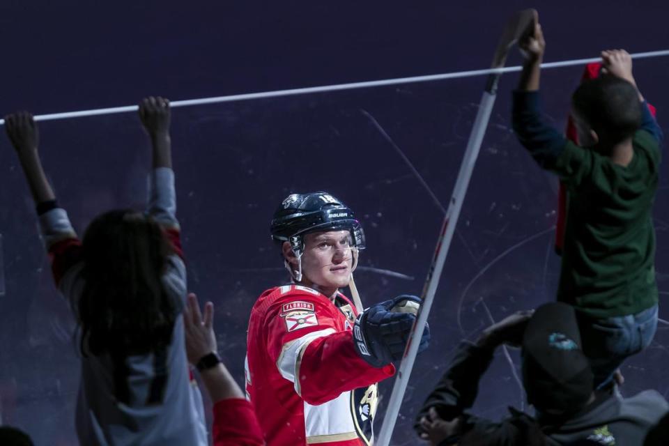 Florida Panthers center Aleksander Barkov (16) gives his hockey stick to a fan after defeating the Minnesota Wild at the BB&T Center in Sunrise, Florida on Friday, March 8, 2019.