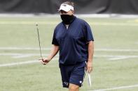 New England Patriots head coach Bill Belichick twirls his whistle before an NFL football training camp scrimmage, Friday, Aug. 28, 2020, in Foxborough, Mass. (AP Photo/Michael Dwyer, Pool)