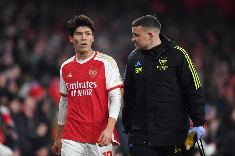 Arsenal defender Takehiro Tomiyasu faces up to six weeks out with a calf injury (Arsenal FC via Getty Images)