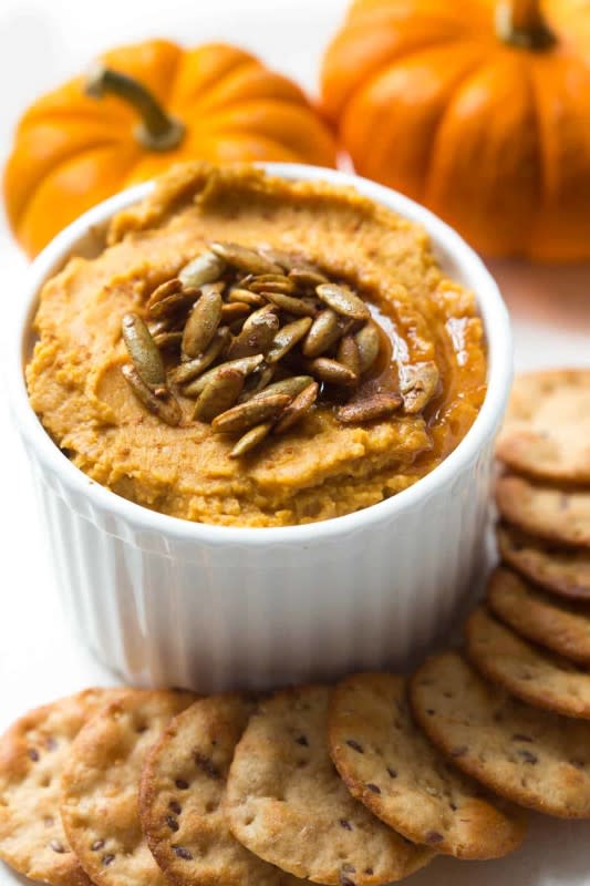 <p>Spoonful of Flavor</p><p>This easy cinnamon spice pumpkin hummus comes together in a food processor in less than 15 minutes! </p><p><strong>Get the recipe: <em><a href="https://www.spoonfulofflavor.com/cinnamon-spice-pumpkin-hummus/" rel="nofollow noopener" target="_blank" data-ylk="slk:Cinnamon Spice Pumpkin Hummus;elm:context_link;itc:0;sec:content-canvas" class="link ">Cinnamon Spice Pumpkin Hummus</a></em></strong></p>