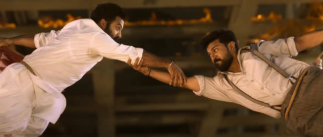 <p>Raftar Creations/Courtesy Everett Collection</p> N.T. Rama Rao Jr. and Ram Charan in 'RRR'
