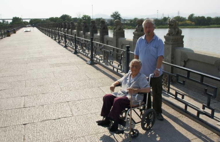 Yan Guiru, 95, sits in a wheelchair on the Marco Polo Bridge, or Lugouqiao, during an interview in west Beijing on July 3, 2015