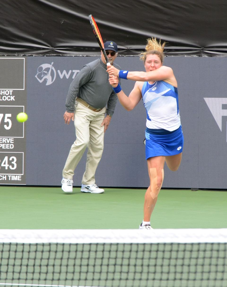 Anna-Lena Friedsam returns a shot during her 7-5, 6-7, 7-6 win over Erika Andreeva on Thursday to advance to the quarterfinals of the ATX Open at Westwood Country Club. The match took 3 hours, 11 minutes to complete.