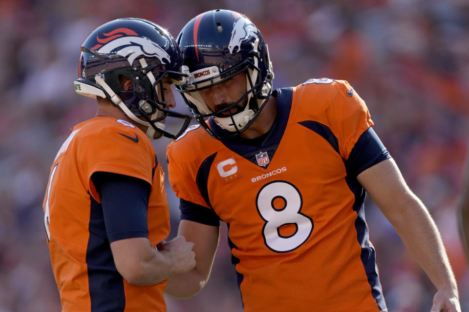 Denver Broncos kicker Brandon McManus (8) celebrates his field goal with punter Sam Martin during the second half of an NFL football game against the New York Jets, Sunday, Sept. 26, 2021, in Denver. (AP Photo/David Zalubowski)